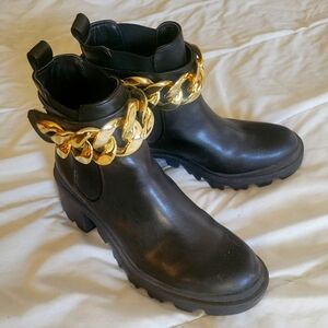 Boots with gold chain detail
